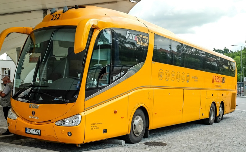  A bus leaving Český Krumlov at sunrise, symbolizing the start of a new adventure.