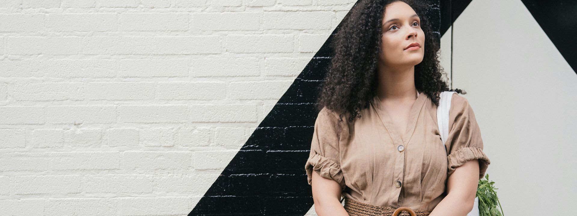 Portrait of a Beautiful Woman Wearing Brown Jumpsuit