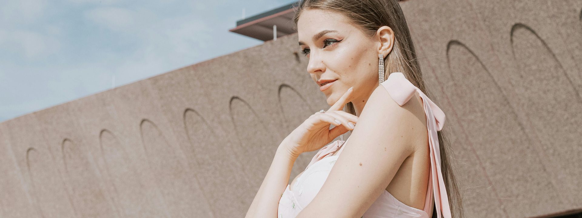 Blonde Woman in Pastel Pink Dress